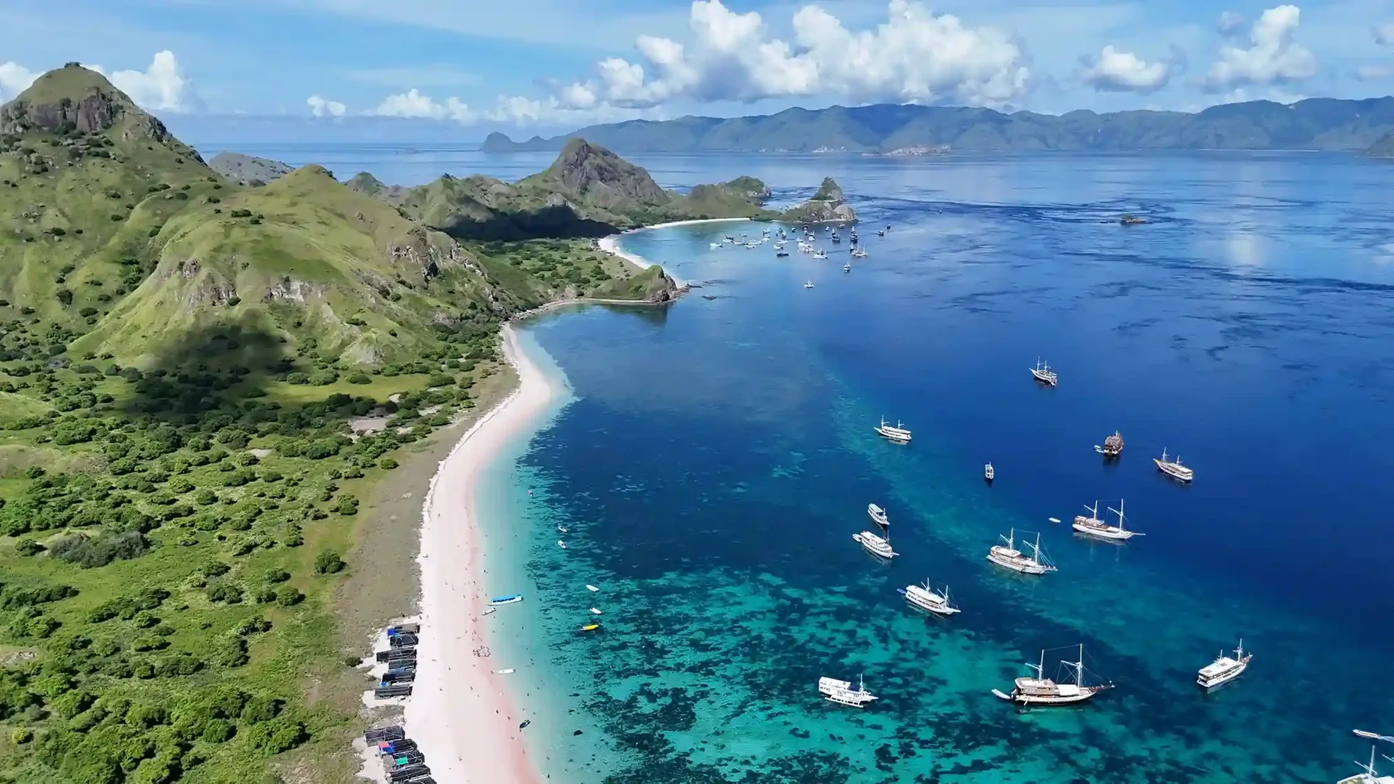 Pink Beach in Komodo National Park with pink-tinted sand meeting turquoise water